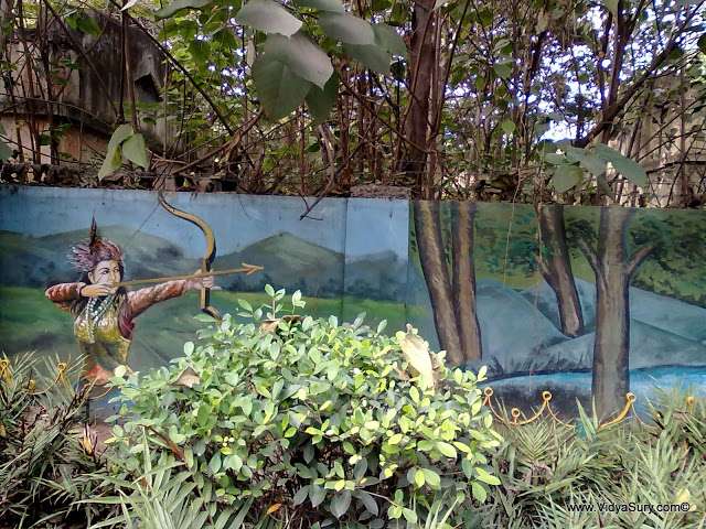 my doorstep - woman hunter aiming arrow