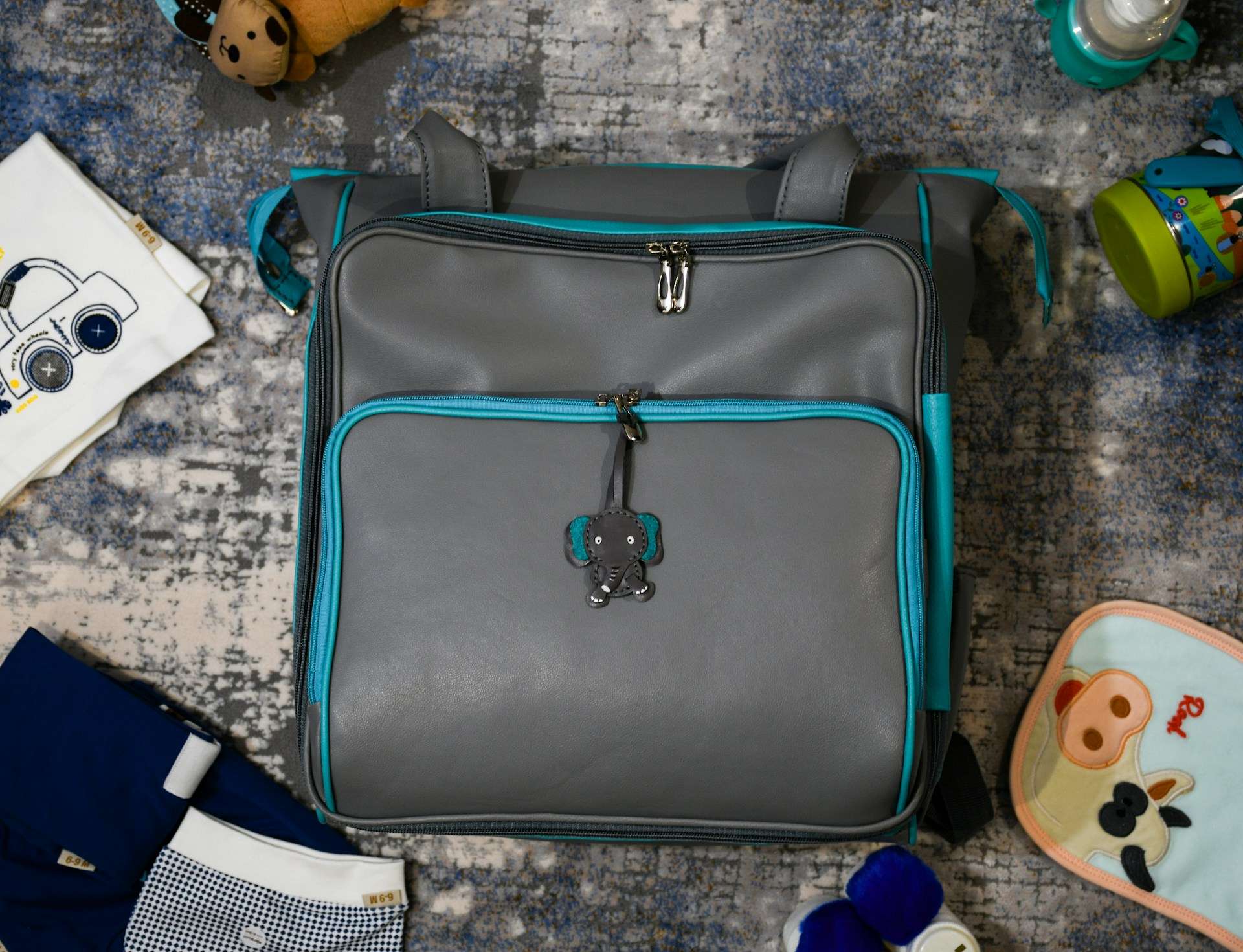7 best handbags for busy moms- grey and black leather handbag