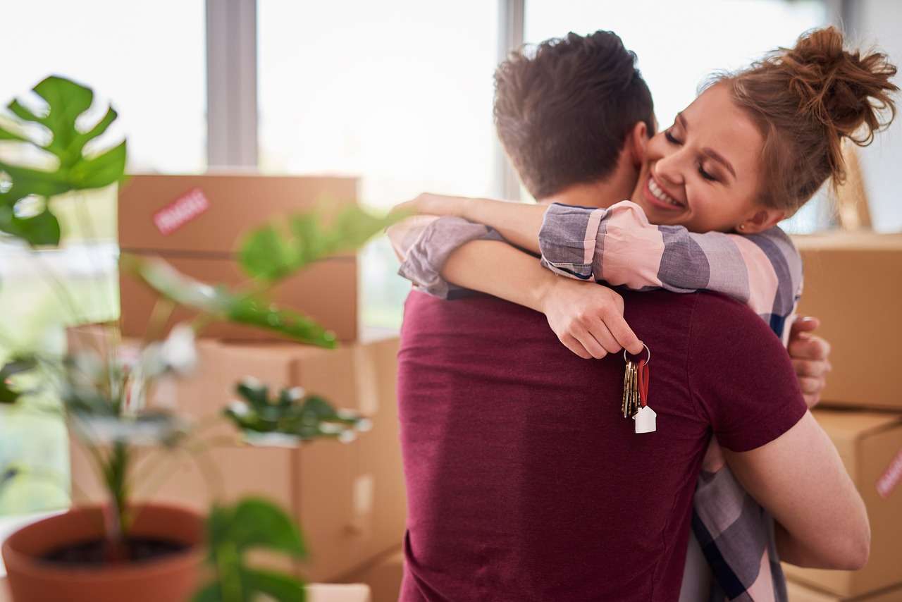 10 Smart (and Sanity-Saving) Tips for Setting Up Your New Home couple, move, key, apartment, owner, home ownership, house, rent, house rental, buy, house key, hold, show, home key, heterosexual couple, embrace, customer, new, relocation, move in, investment, housing project, change, sale, sell