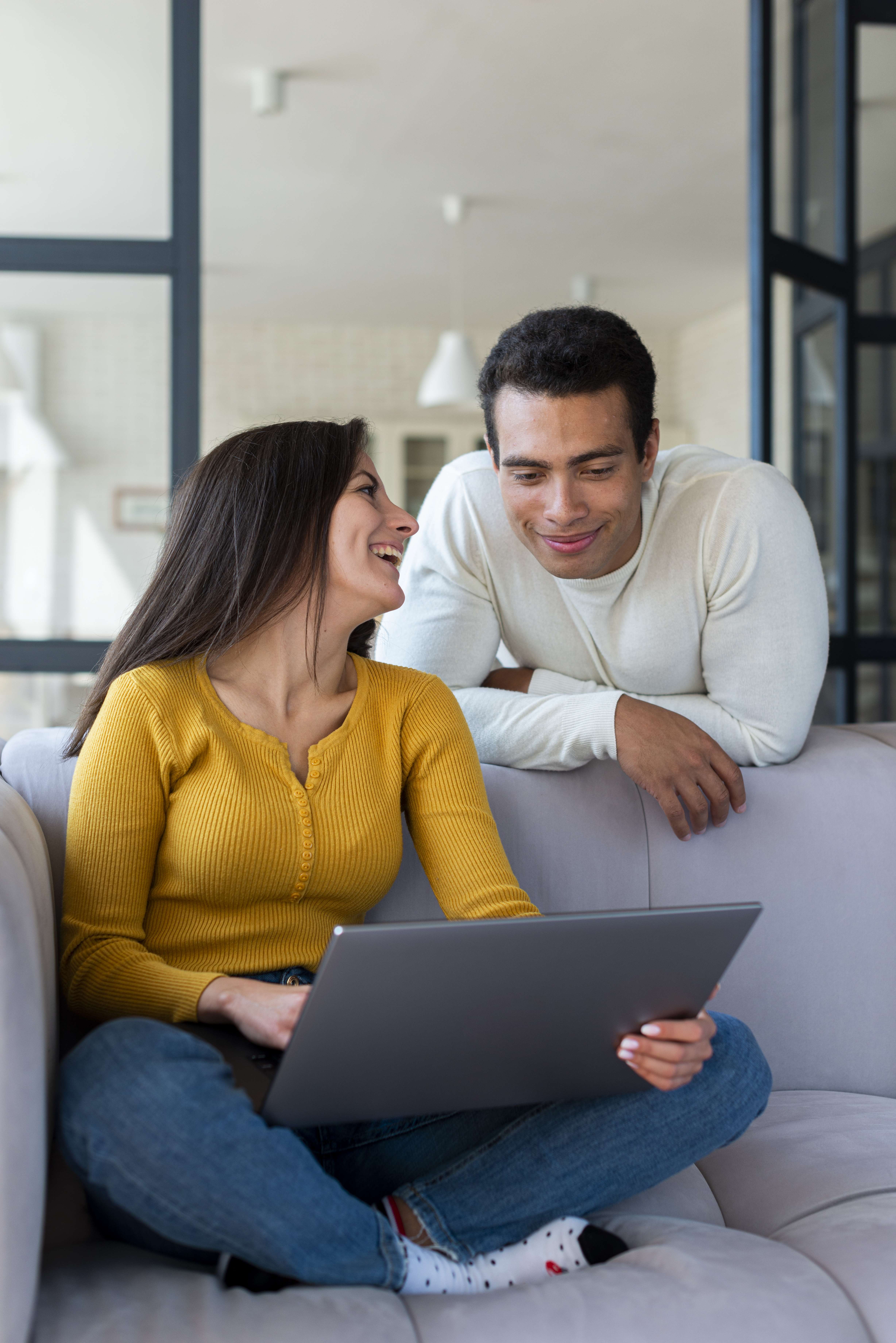 Woman smiling at man - term insurance calculator