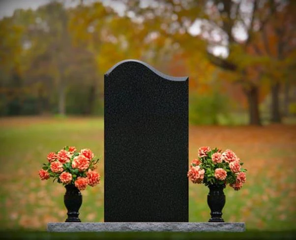 Symbolism in Headstone Engravings: Flowers, Crosses, and More