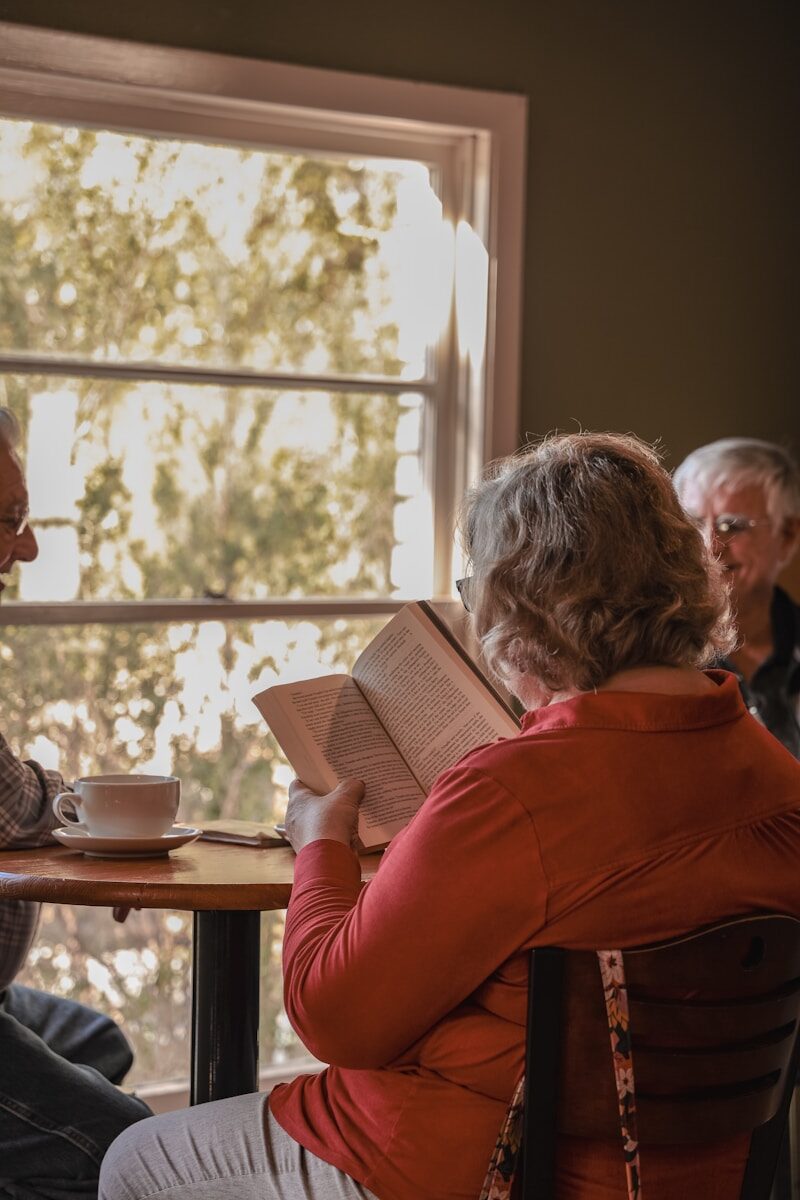 Engaging Activities to Enhance Social Connections for Seniors a person reading a book