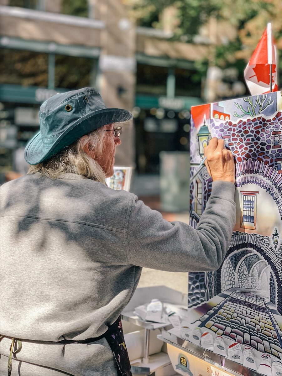 Engaging Activities to Enhance Social Connections for Seniors man painting building