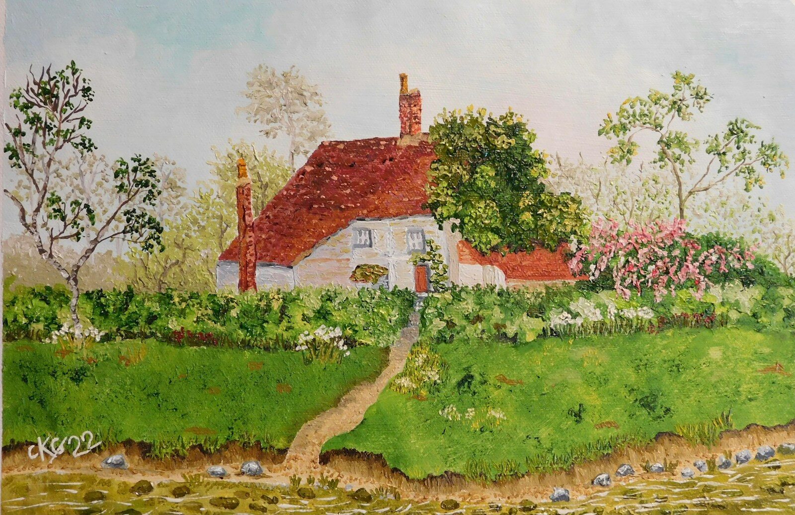 What to Do When You Can’t Afford to Fix Your Home Before Selling a house with a garden and a path leading to it