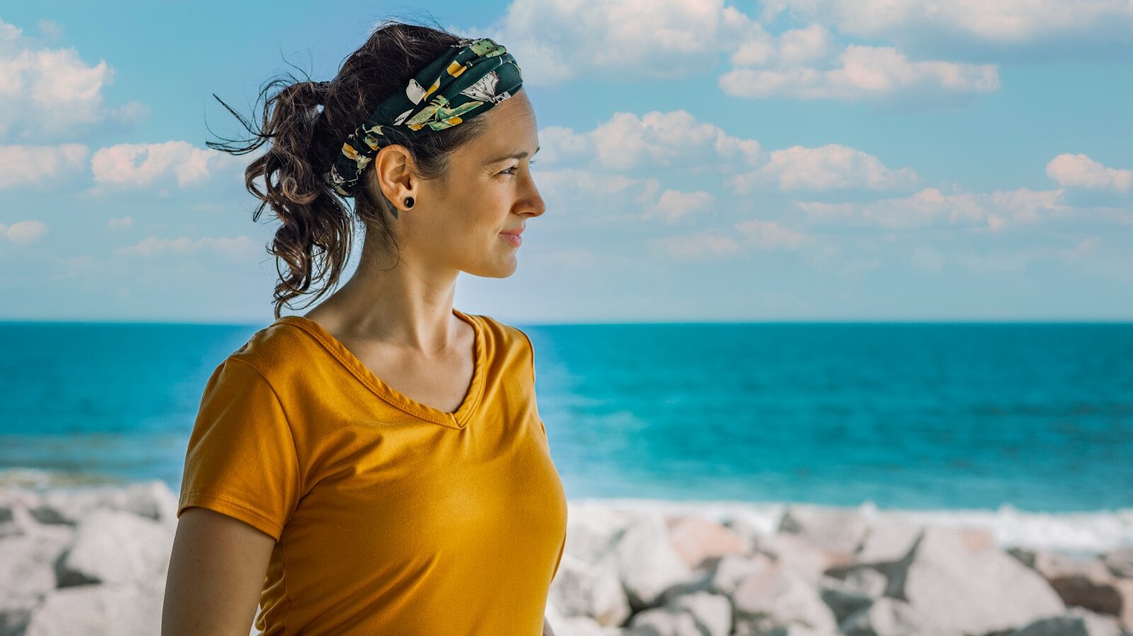 Sustainable Weight Loss Habits for Modern Lifestyles woman in yellow crew neck shirt wearing green and blue floral headband