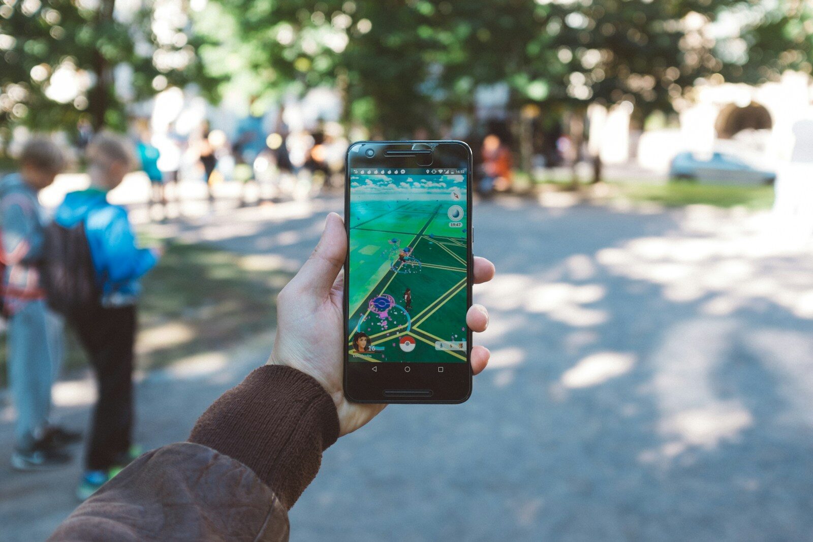 The Future of Maps and Navigation Apps: Emerging Trends and Technologies person playing Pokemon Go during daytime