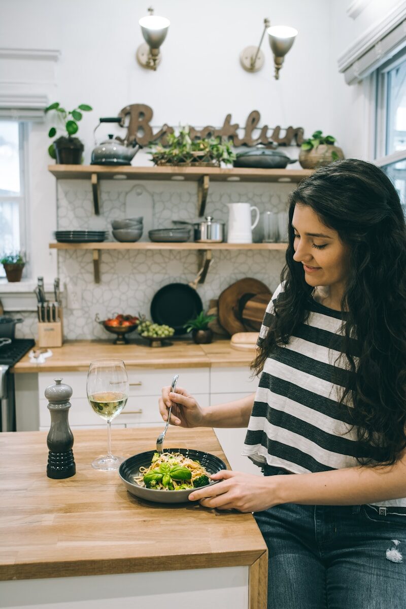 Why Holistic Detox Requires Healing Both Mind and Body woman sitting in front of table
