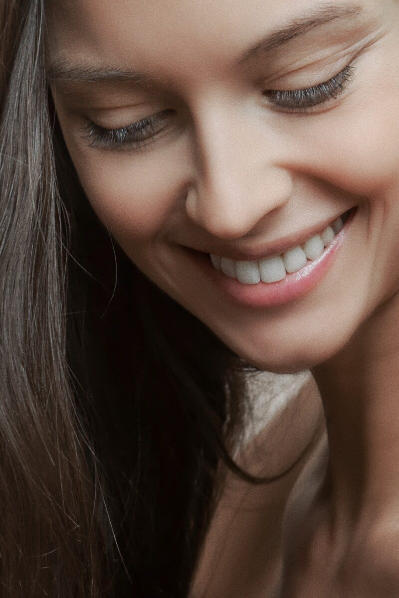 Revolutionizing Facial Rejuvenation: The Role of Injectables in Modern Aesthetics woman smiling face