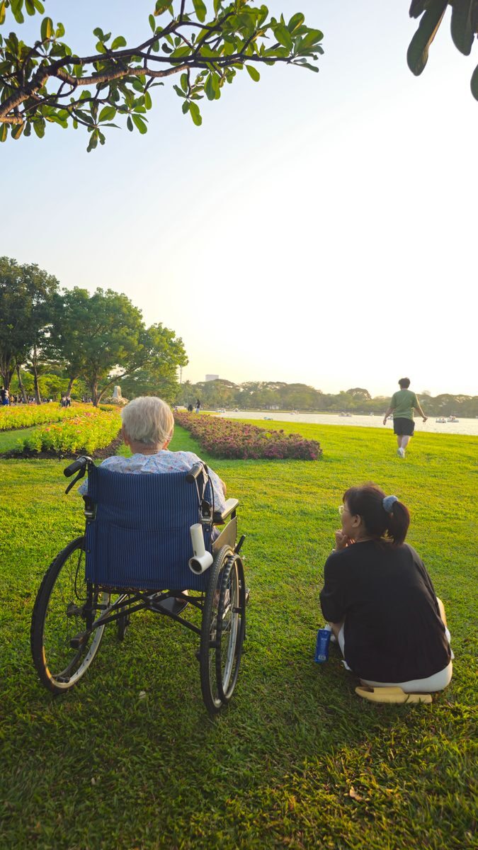 7 Best In-Home Care Services for Seniors in Dallas - Fort Worth (2026) Elderly person and caregiver enjoy a serene afternoon by the river in Bangkok.