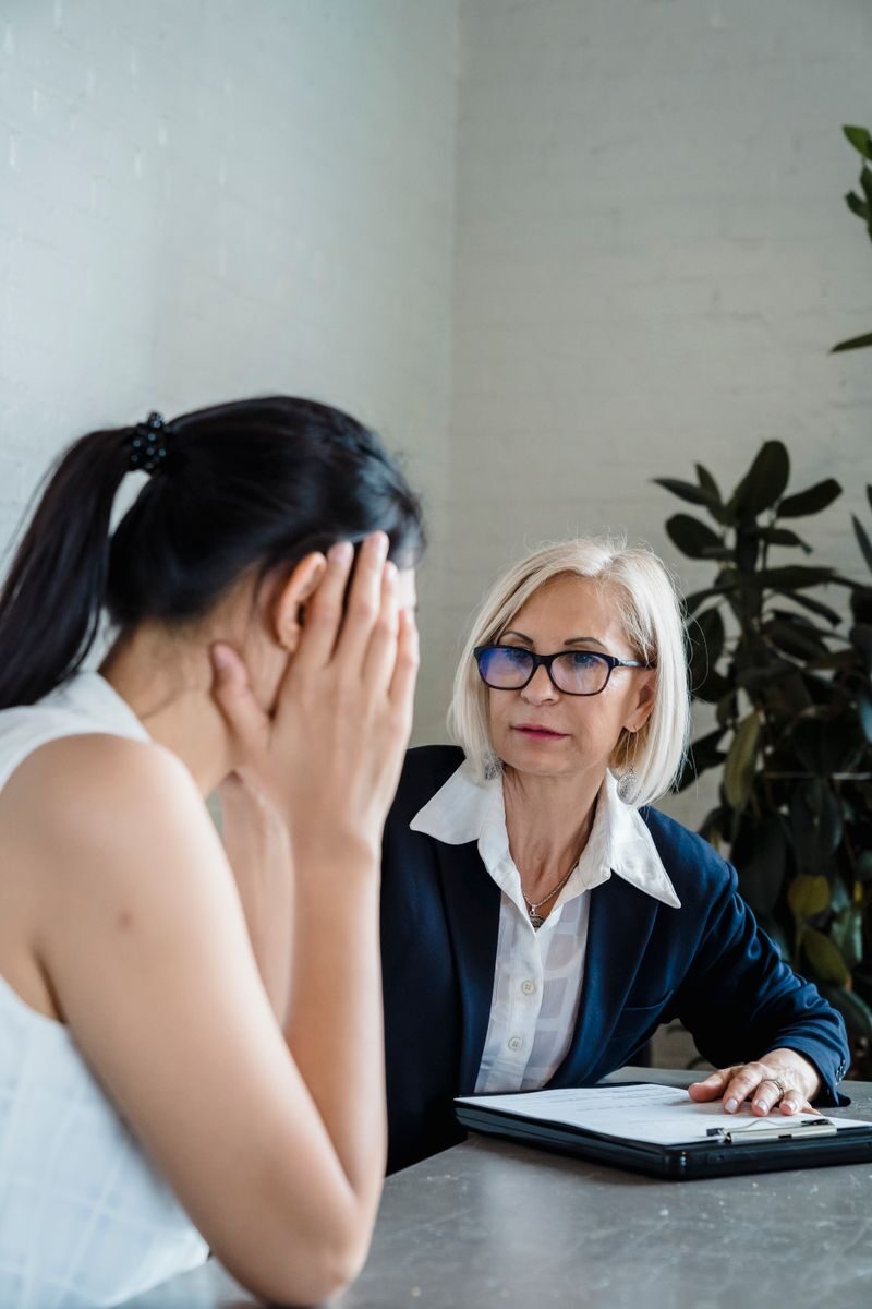 Why Am I Still Depressed Even on Antidepressants? How Depression Treatment Costa Mesa Helps?Two women engaged in a counseling session in a modern office setting.